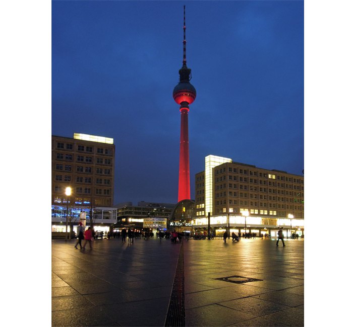 Berlin Alexanderplatz and red illuminated TV-Tower at night - photo cult berlin